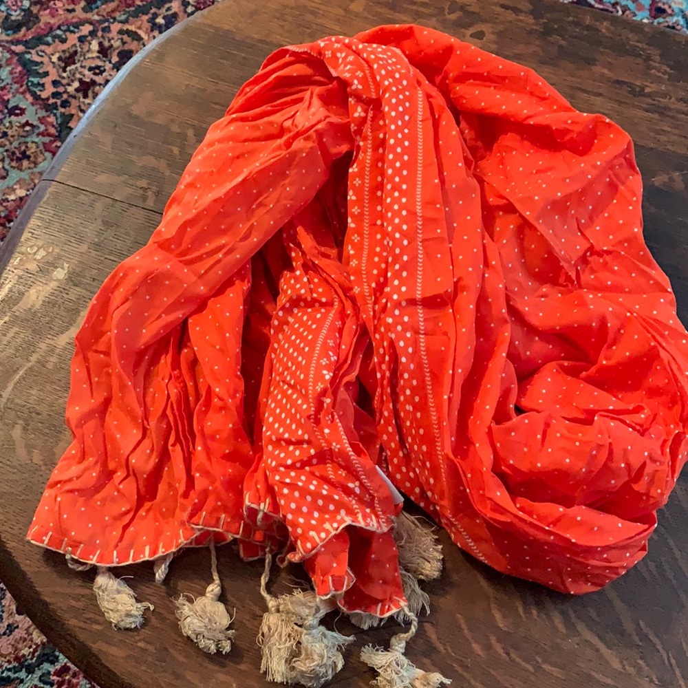 Deep orange scarf with tasseled ends